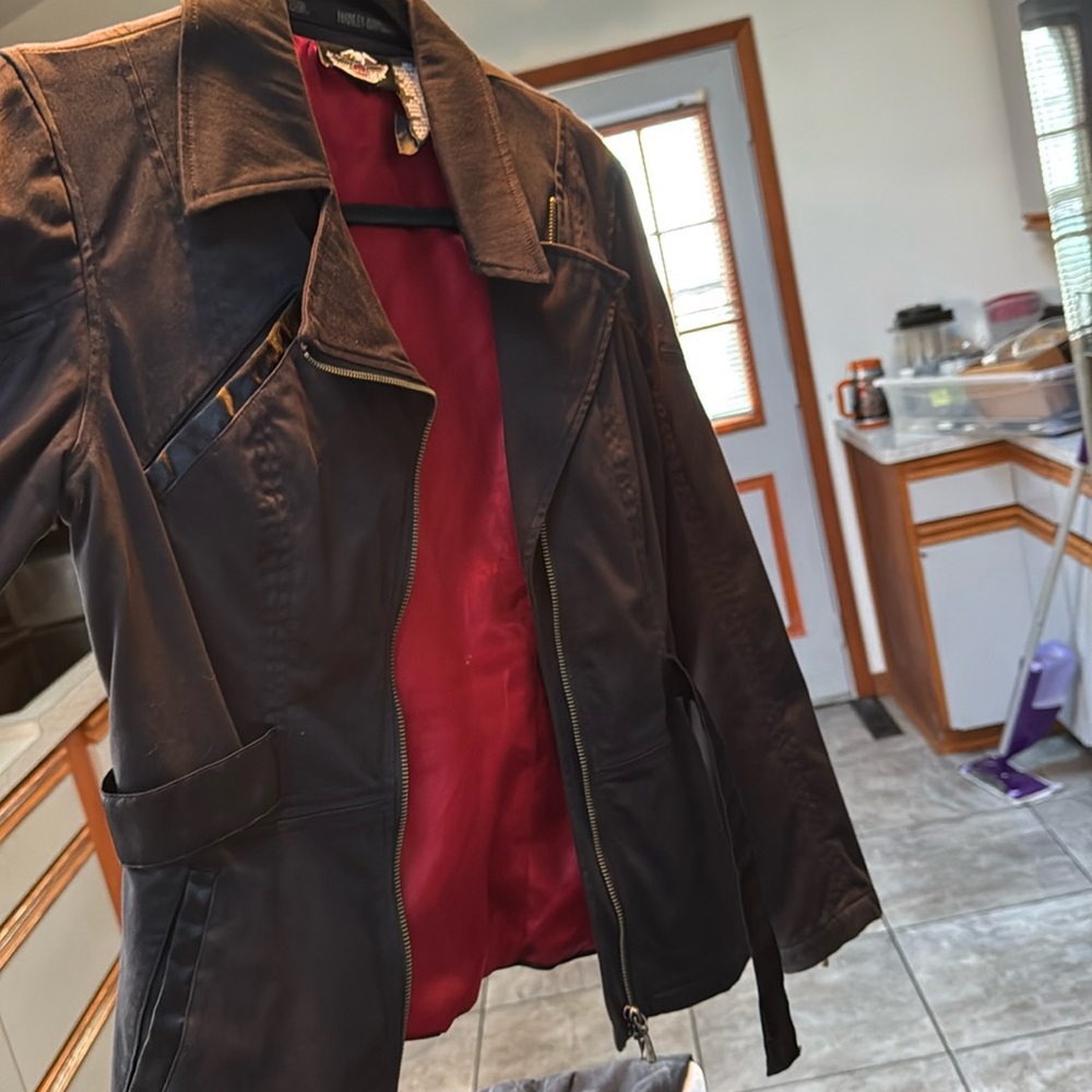 Jacket red inside but showing up pink in photo
